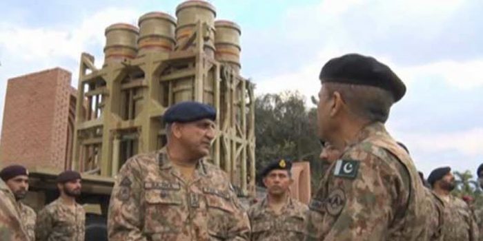 GENERAL QAMAR BAJWA IS STANDING IN FRONT OF NEWLY ACQUIRED HQ-16 AIR DEFENSE SYSTEM