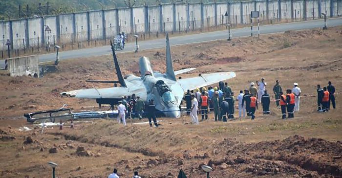 People gathered at the crashed Site of MiG 29