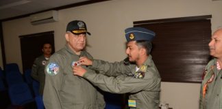 WING COMMANDER NAUMAN AKRAM PLACING BADGE TO COAS GENERAL BAJWA