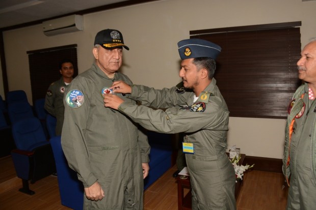 WING COMMANDER NAUMAN AKRAM PLACING BADGE TO COAS GENERAL BAJWA
