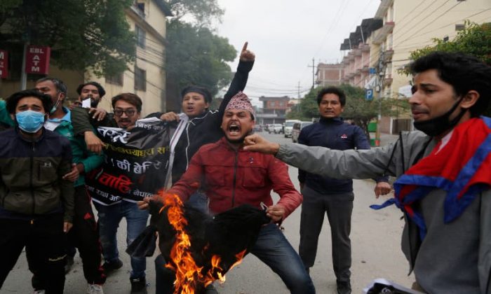 Brave Nepalese people Burned indian Flag in front of indian embassy in Kathmandu