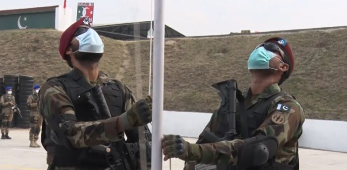 Operators of PAKISTAN ARMY SSG Commandos raising Sacred PAKISTANI FLAG during ATATURK-XI 2021 Exercise