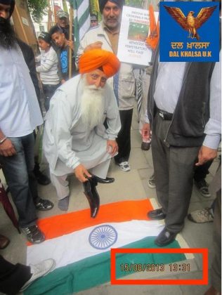 sikh standing on indian flag
