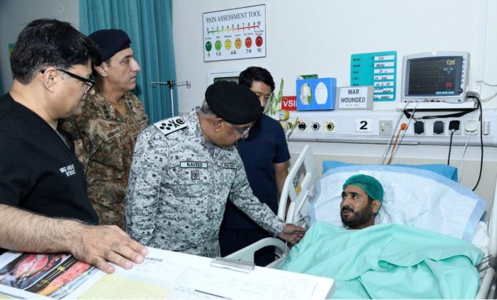PAK NAVAL CHIEF Adm Muhammad Naveed Ashraf Pays Rich Tribute To The Injured Bravest Sons of Sacred PAKISTAN During MARKA-E-HAQ OPERATION BUNYAN-UM-MARSOUS